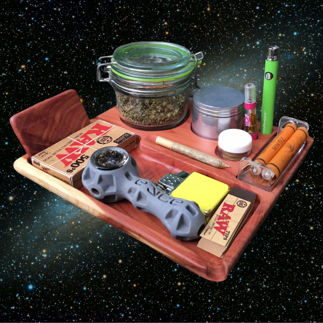 collection of weed Smoking Accessories from rolling trays, grinders, glass joint tips, glass blunt tips.