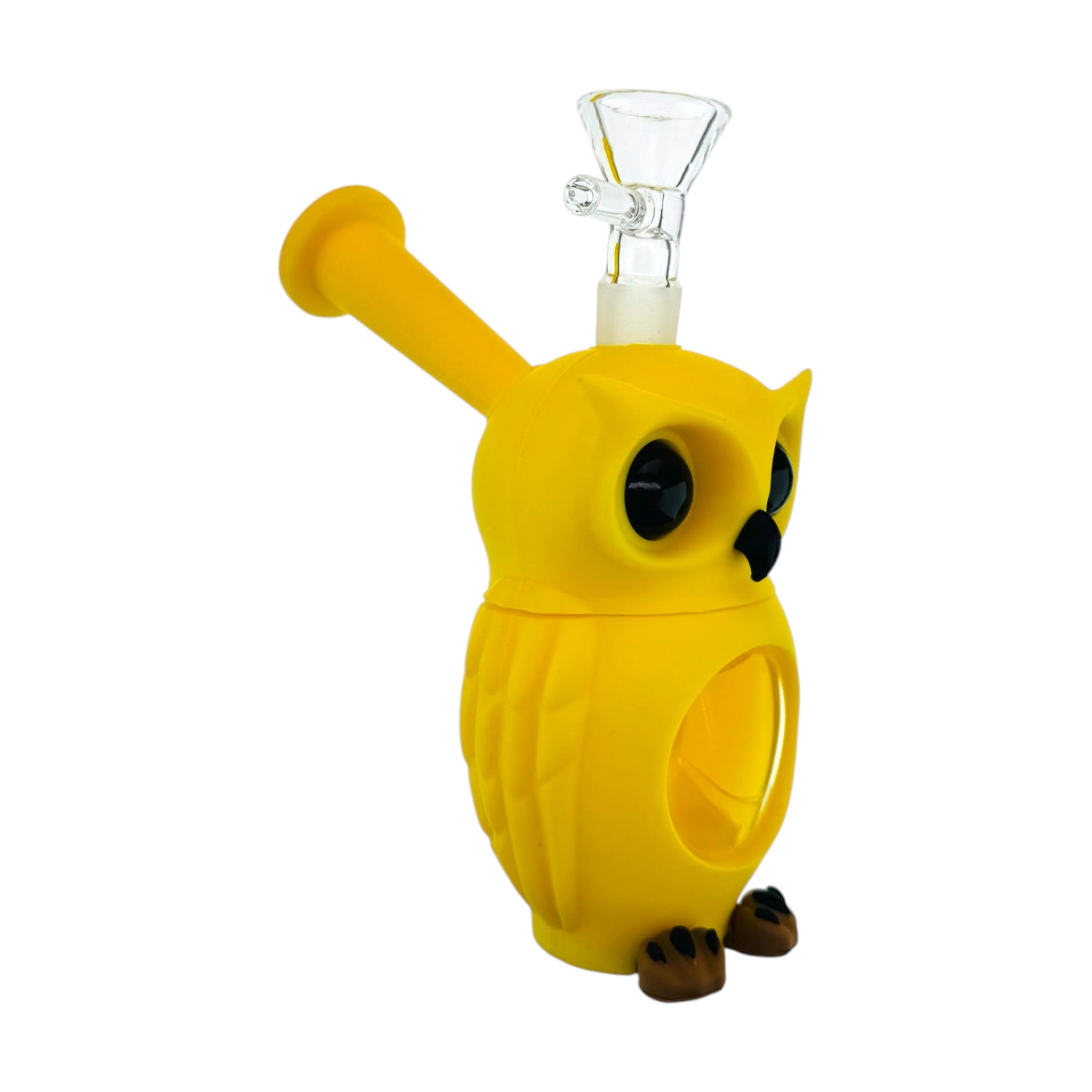 A yellow owl-shaped silicone or rubber water pipe bong with a clear glass bowl piece attached at the top, photographed on a plain white background.