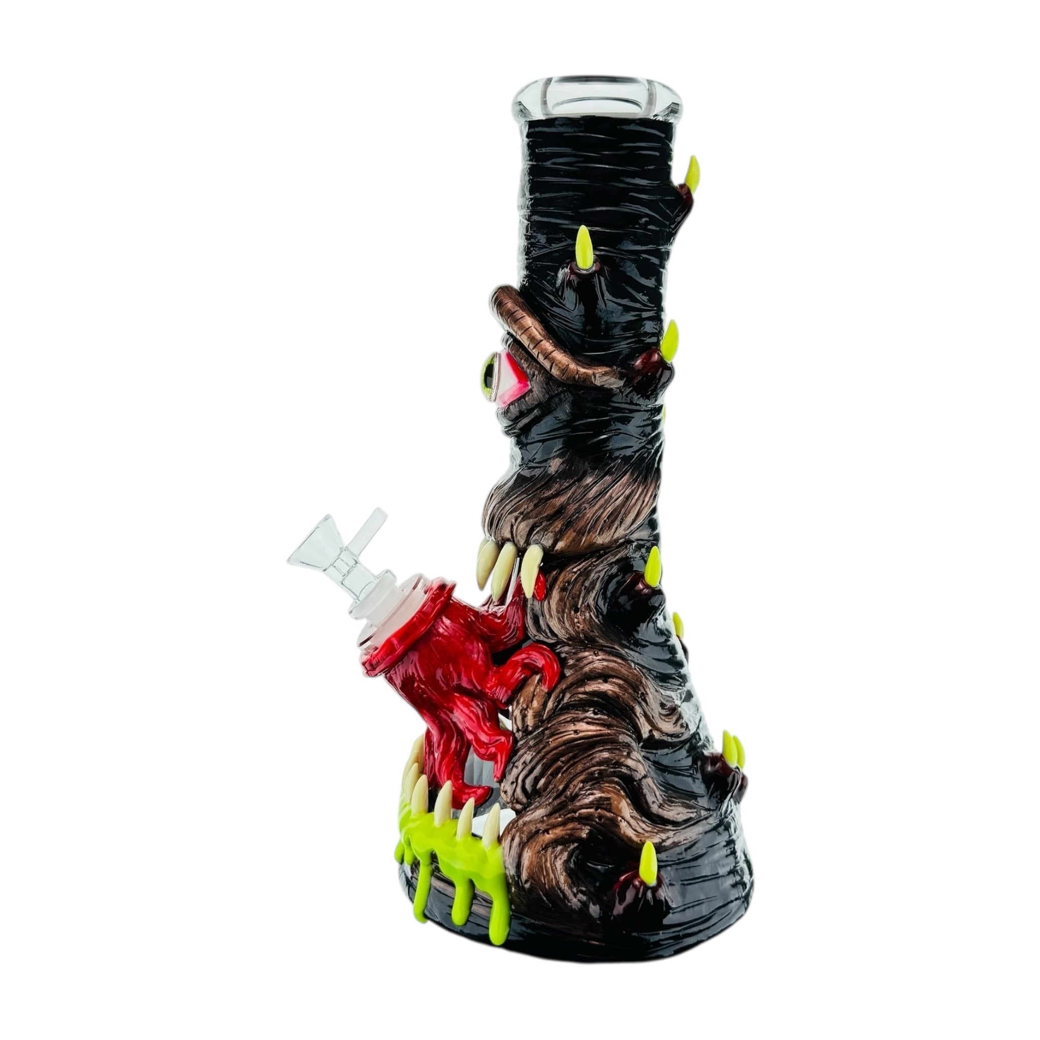 Novelty glass smoking water pipe with monster design on a white background