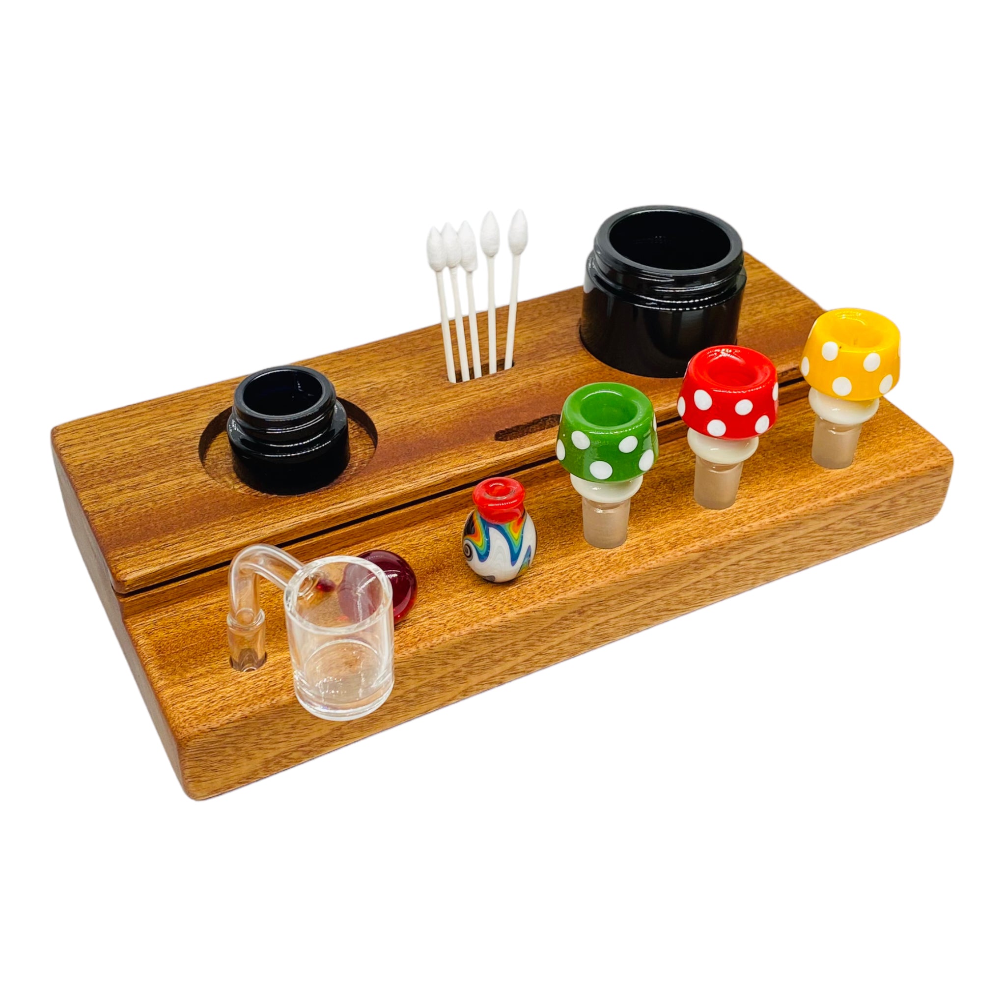 This Multi Hole Wood Dab Station And Display Stand Holder is made from premium mahogany and features two different sized holes for jars, two slots to hold Q Tips, and three 10mm and 14mm holes to hold various bong bowl pieces or quartz bangers. A perfect storage solution for the dab connoisseur.