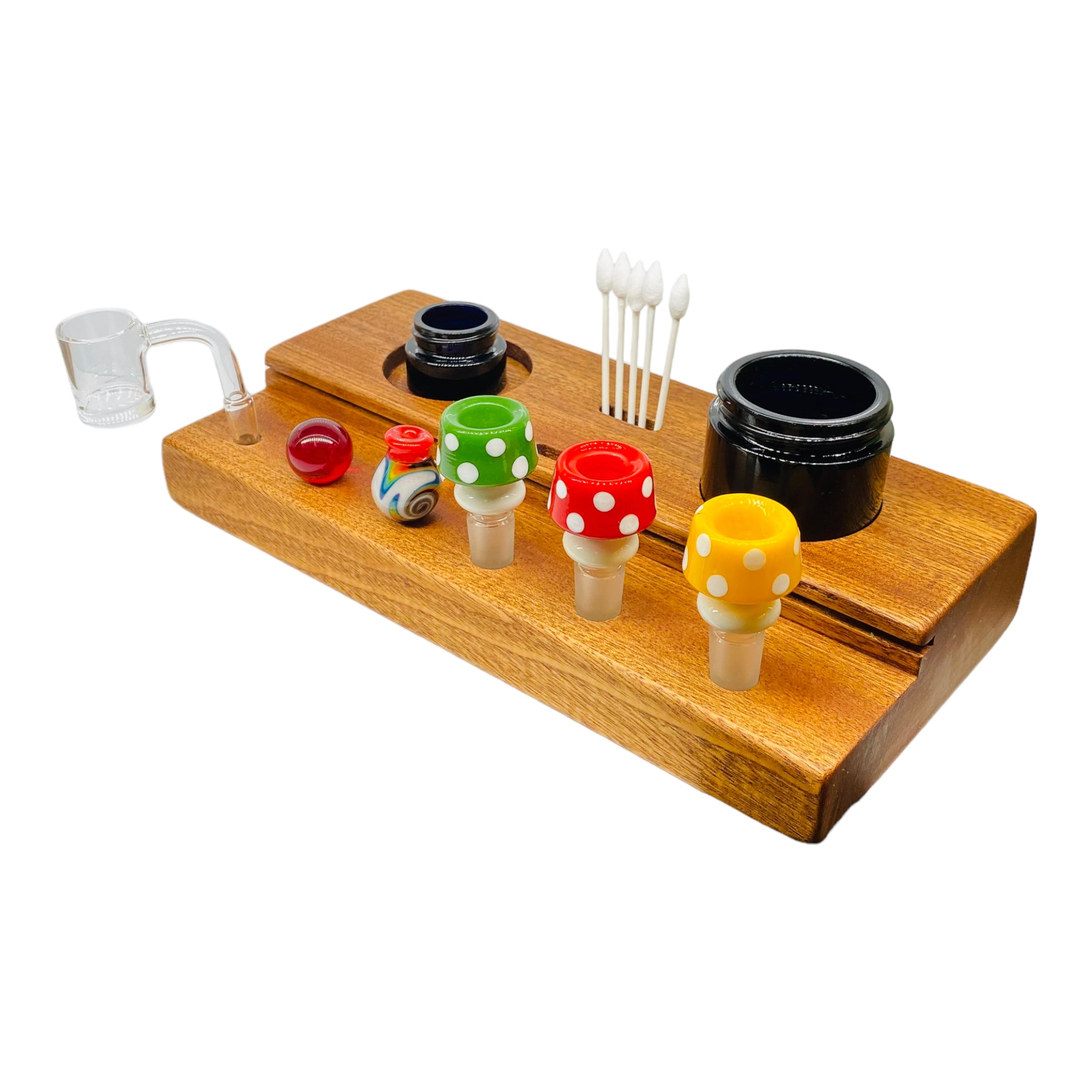 This Multi Hole Wood Dab Station And Display Stand Holder is made from premium mahogany and features two different sized holes for jars, two slots to hold Q Tips, and three 10mm and 14mm holes to hold various bong bowl pieces or quartz bangers. A perfect storage solution for the dab connoisseur.