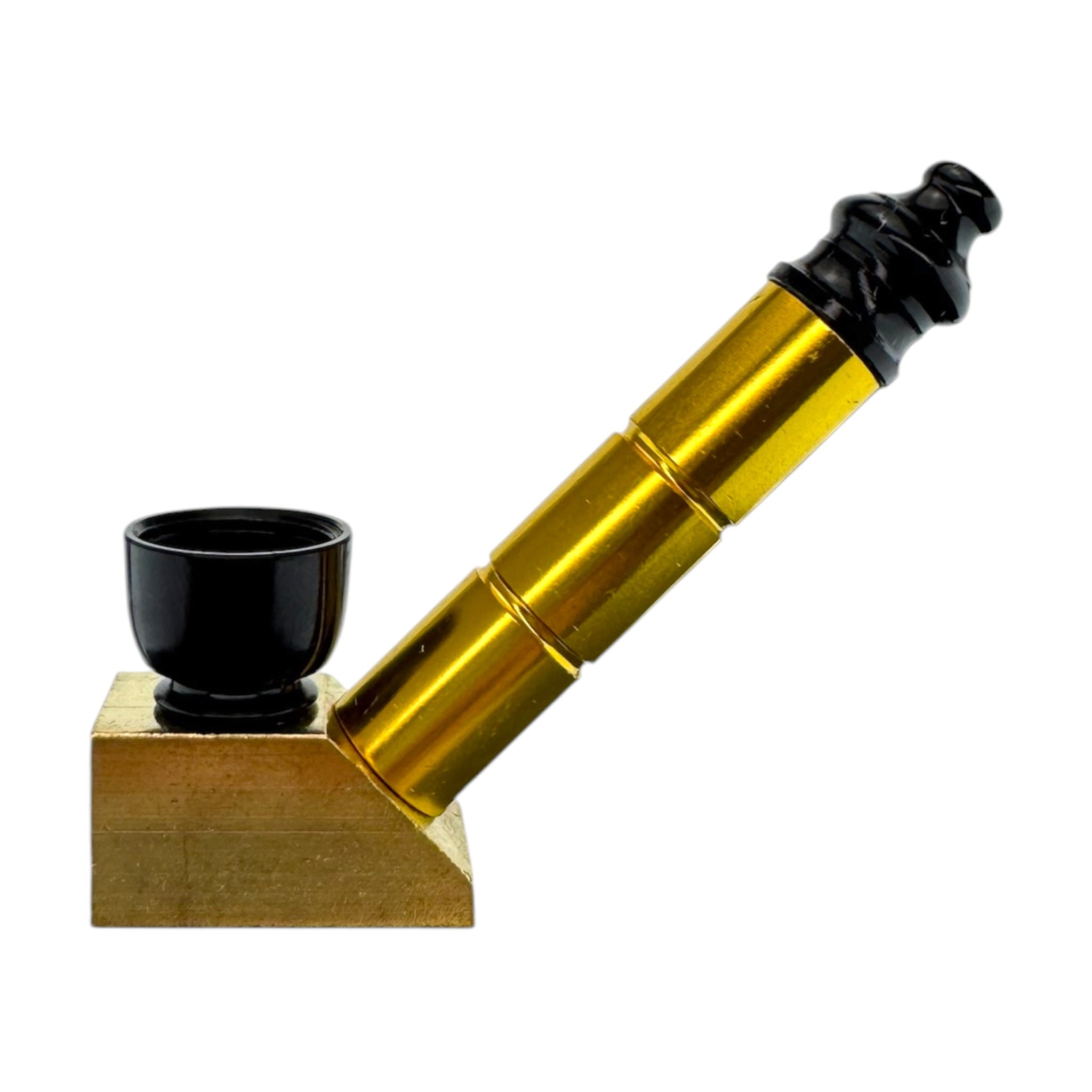 A gold-colored segmented pipe with a black bowl and mouthpiece, resting on a small wooden base against a plain white background.