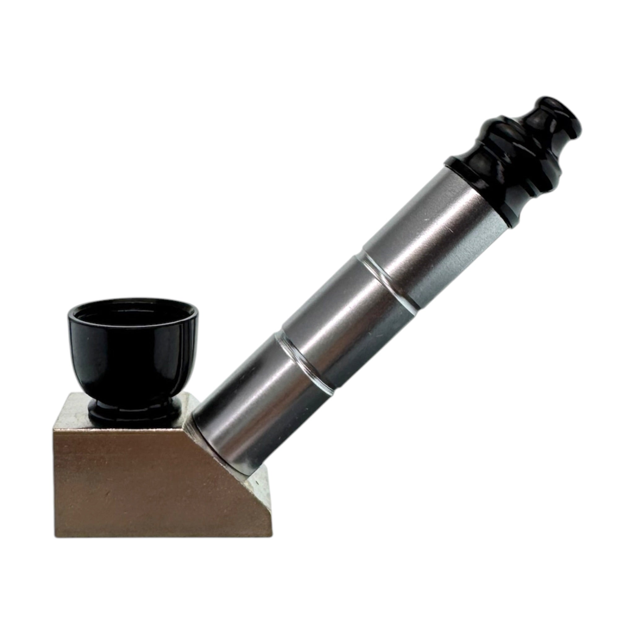 A stainless steel pipe with a black mouthpiece and a black bowl, resting on a brown triangular base against a white background.