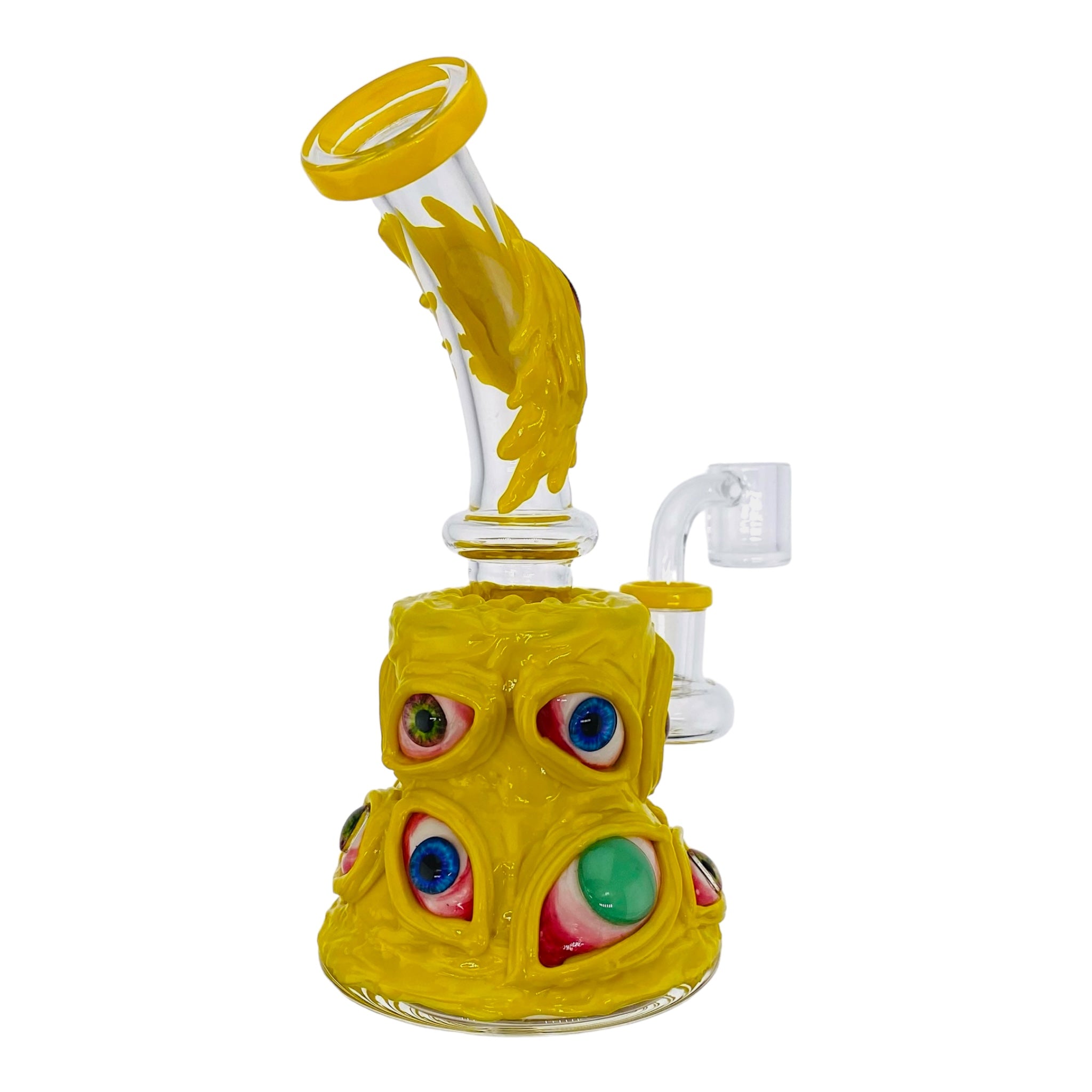 small glass dab rig in yellow banger hanger