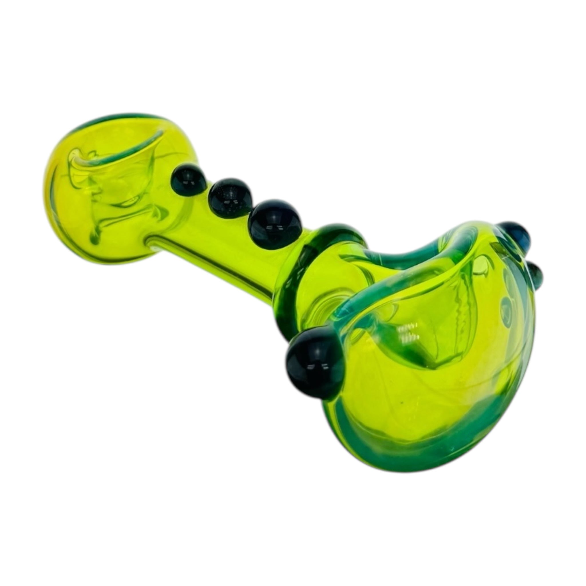 Glass pipe with a green and black design on a white background
