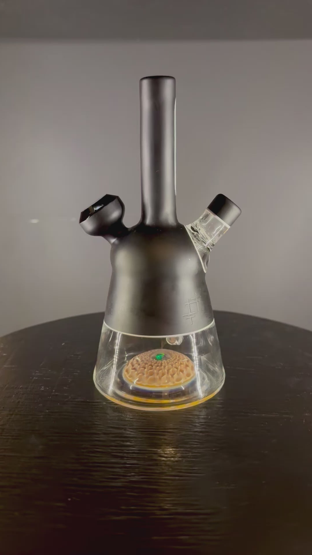 video of yunk glass heady dab rig with clear carve base