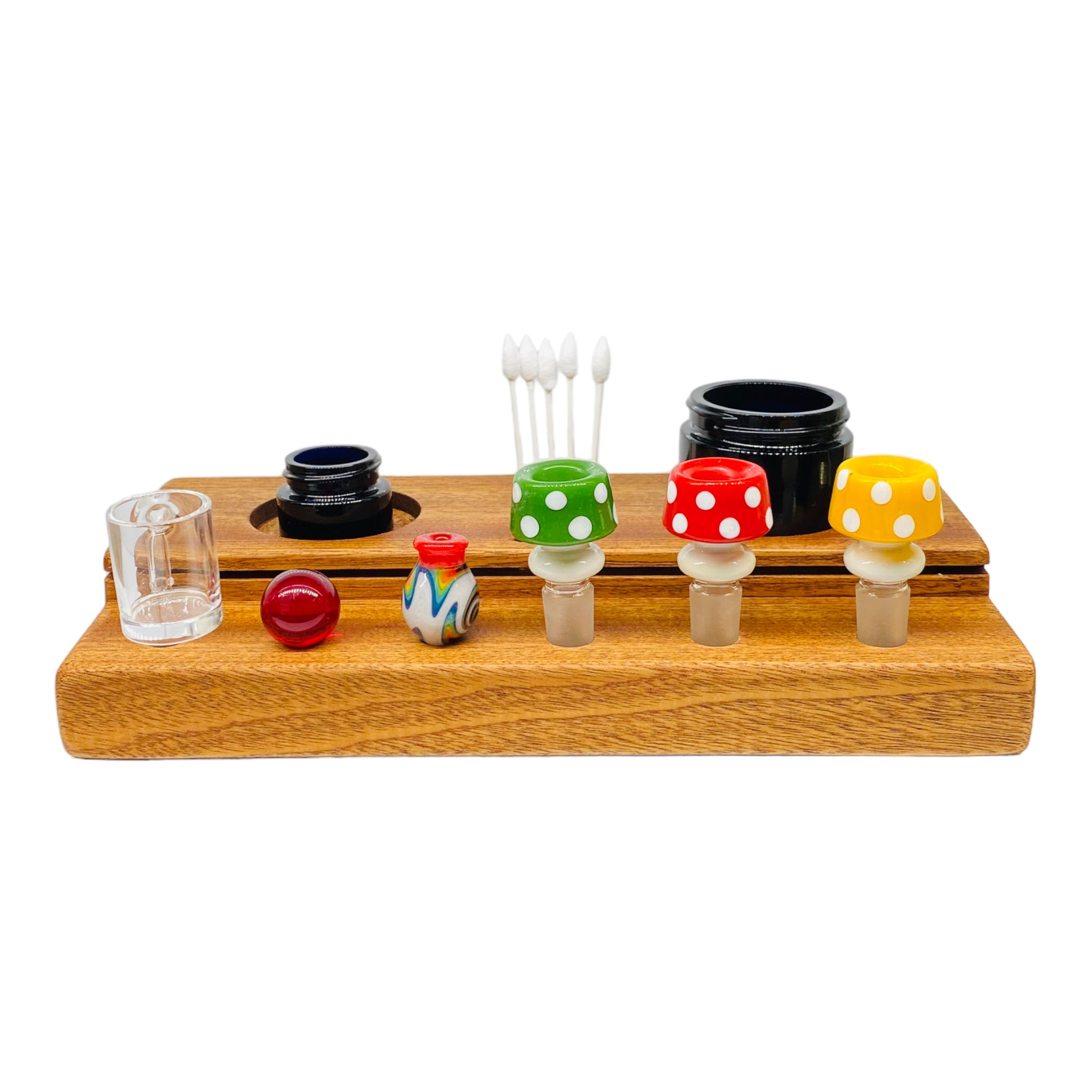 This Multi Hole Wood Dab Station And Display Stand Holder is made from premium mahogany and features two different sized holes for jars, two slots to hold Q Tips, and three 10mm and 14mm holes to hold various bong bowl pieces or quartz bangers. A perfect storage solution for the dab connoisseur.